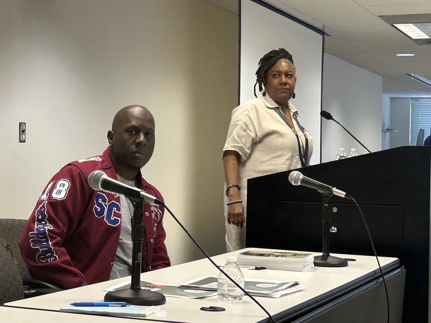 Marlo Prioleau and a school staff member leading a session from the front of a classroom
